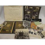 A selection of various photographs and paperwork relating to Lt. Cmr. N.A.J.