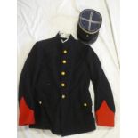 A French Republican Guard blue tunic with gilt buttons and a French kepi with silver wire
