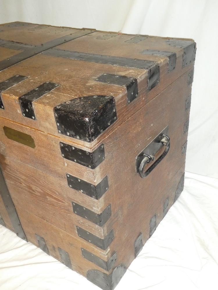 A 19th century metal-bound oak rectangular domed trunk with hinged lid and iron handles, - Image 2 of 3