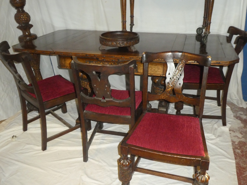 An unusual 1930/40's suite of carved oak matching dining and lounge furniture comprising a - Image 2 of 6