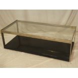 A 1960's brushed steel rectangular glass top coffee table 48" x 21½"
