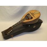 An old rosewood mandolin by Pietro Tonelli of Naples in fitted case