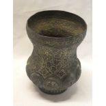 An old Middle Eastern bronze tapered vase decorated in relief with numerous flowers 6" high