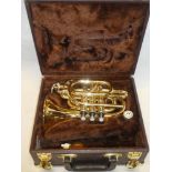 A good quality brass cornet by H.