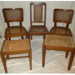 A pair of Colonial-style beech occasional chairs with canework seats and backs on square legs