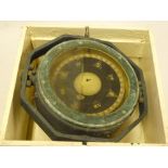 A marine liquid compass with gimbled mount in painted wood case