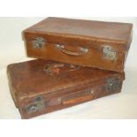Two old brown leather suitcases