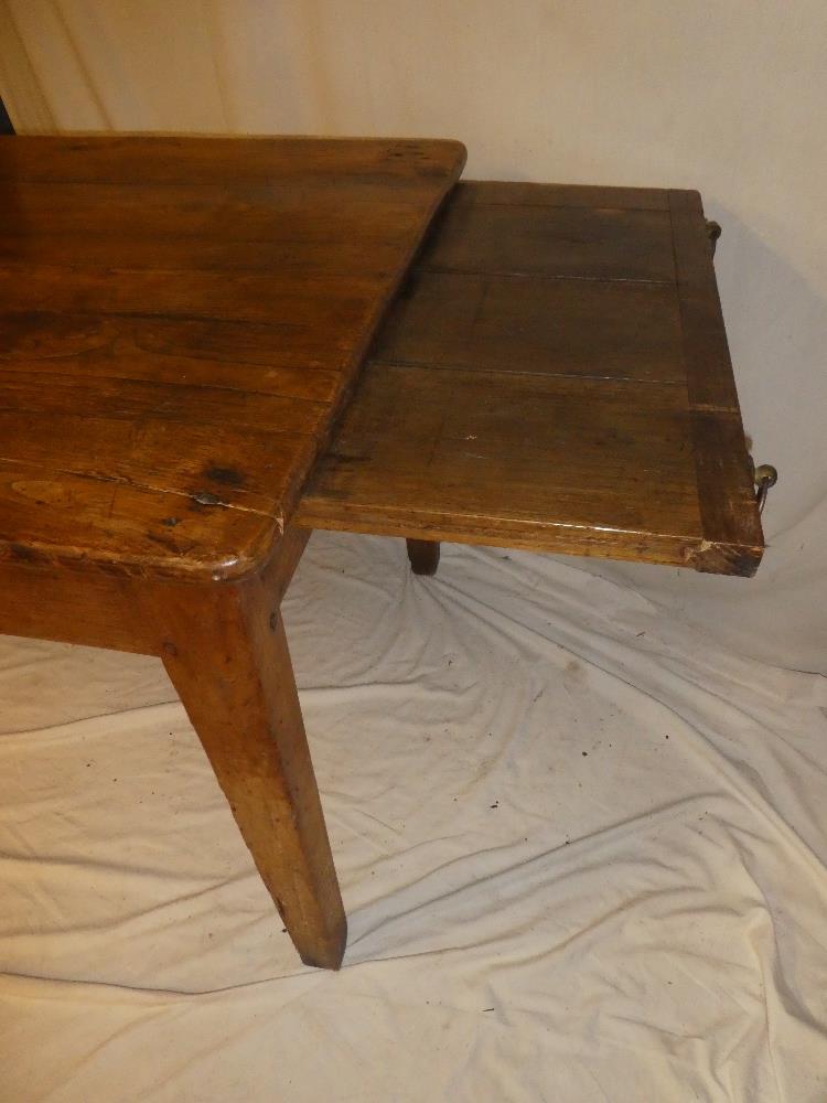 A 19th century polished elm kitchen table with a pull-out slide in one end opposing a single end - Image 5 of 5