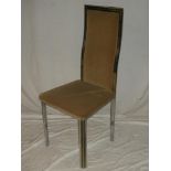 A 1960/70's chromium plated occasional chair upholstered in fabric on angular legs