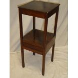 A 19th century mahogany square two tier night stand with a single drawer in the frieze on square