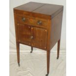 A 19th century inlaid mahogany gentleman's washstand with adapted interior and hinged covers above