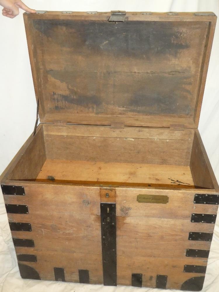 A 19th century metal-bound oak rectangular domed trunk with hinged lid and iron handles, - Image 3 of 3