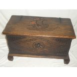 A good quality heavily carved oak rectangular coffer,