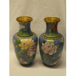 A pair of Chinese cloisonne enamelled tapered vases with floral decoration on pale blue ground,