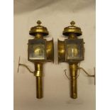 A pair of brass carriage lamps and brackets,