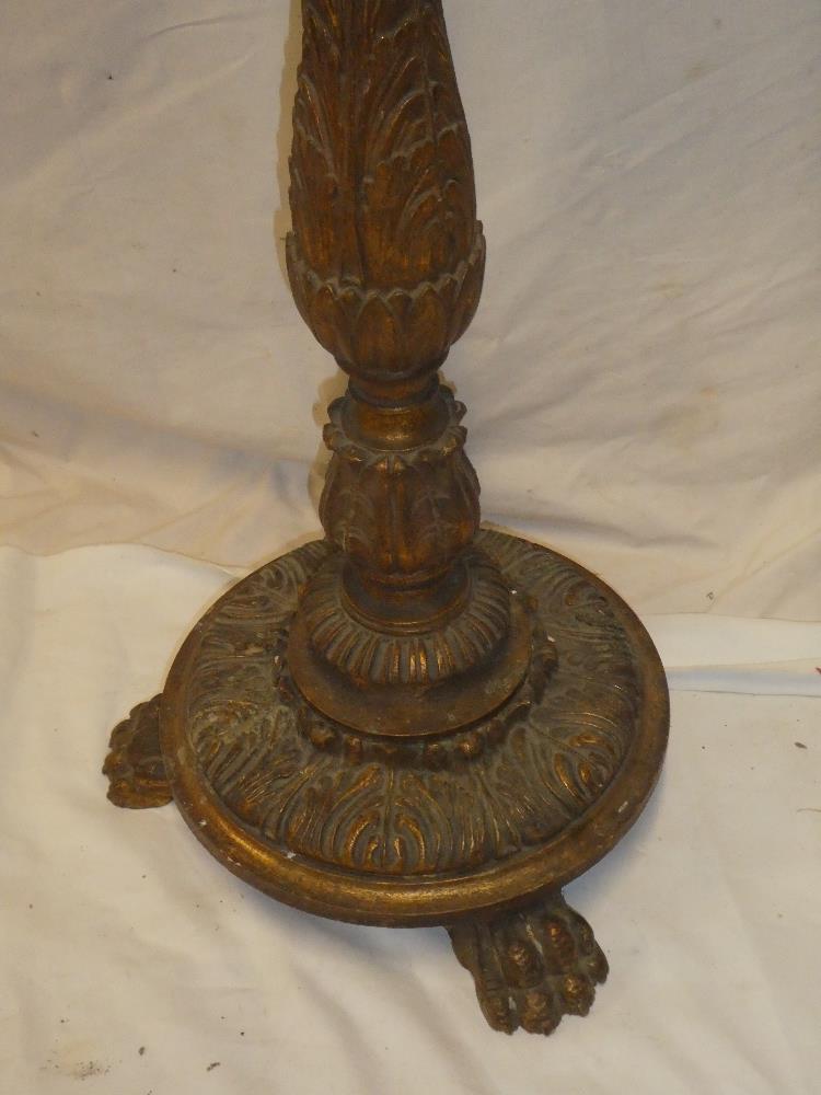 An old gilt painted candle stand/lamp base with raised scroll decoration on circular base with paw - Image 2 of 2