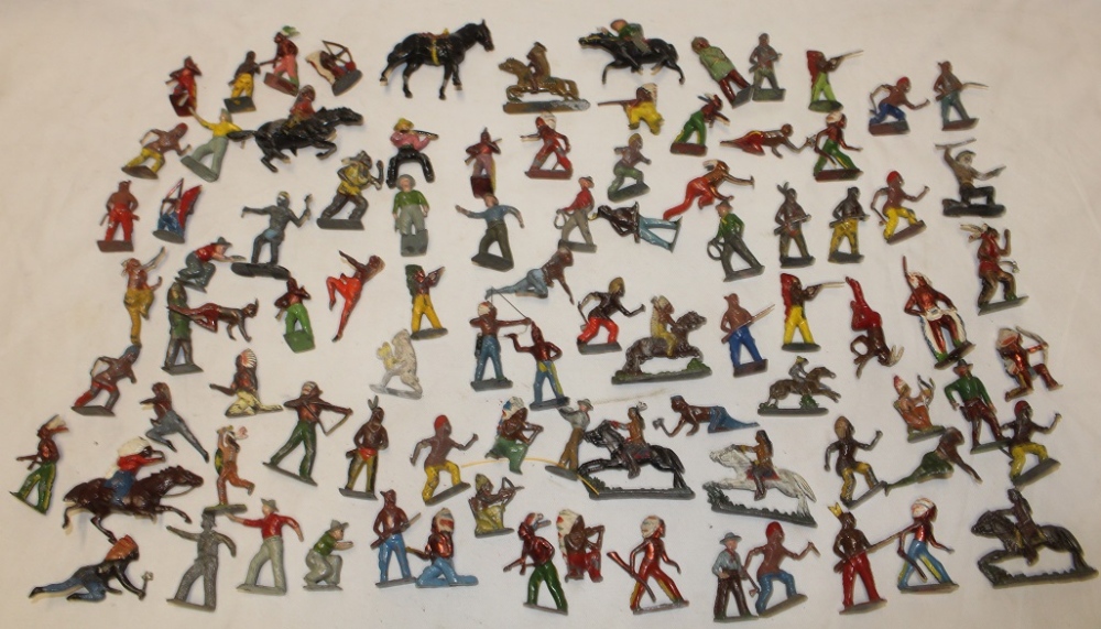 A large selection of various painted metal cowboy and Indian figures including Britain's etc.