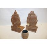 A pair of carved teak bookends with sailing ship decoration "From the Teak of HMS Warspite" and a