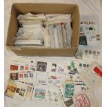 A box containing a large selection of GB first day covers, postal covers, PHQ cards etc.