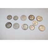 Seven pre-1947 silver shillings and 4 sixpences