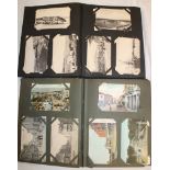 Two albums containing a large selection of various black and white and coloured postcards - Foreign