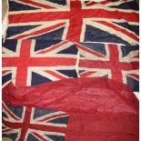Three old Union Jack flags and an Ensign flag (4)