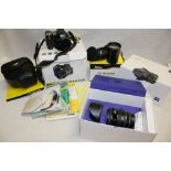 A virtually new Nikon Coolpix 5700 camera in box with accessories together with unused Nikon