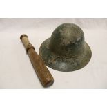 A Second War Home Service steel helmet with liner and a wooden truncheon (2)