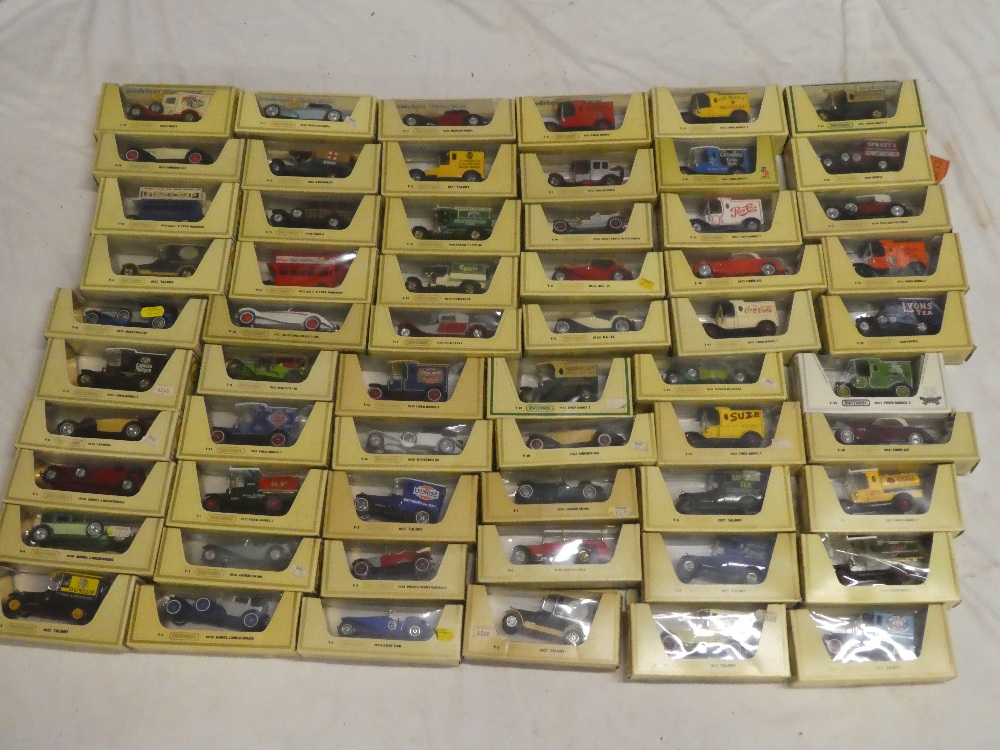 A collection of over 60 various Matchbox models of Yesteryear mint and boxed vintage vehicles in