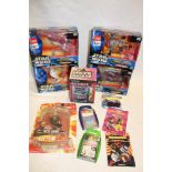 A selection of boxed Star Wars figures together with two Marvel Top Trumps sets, boxed Bandit Bank,