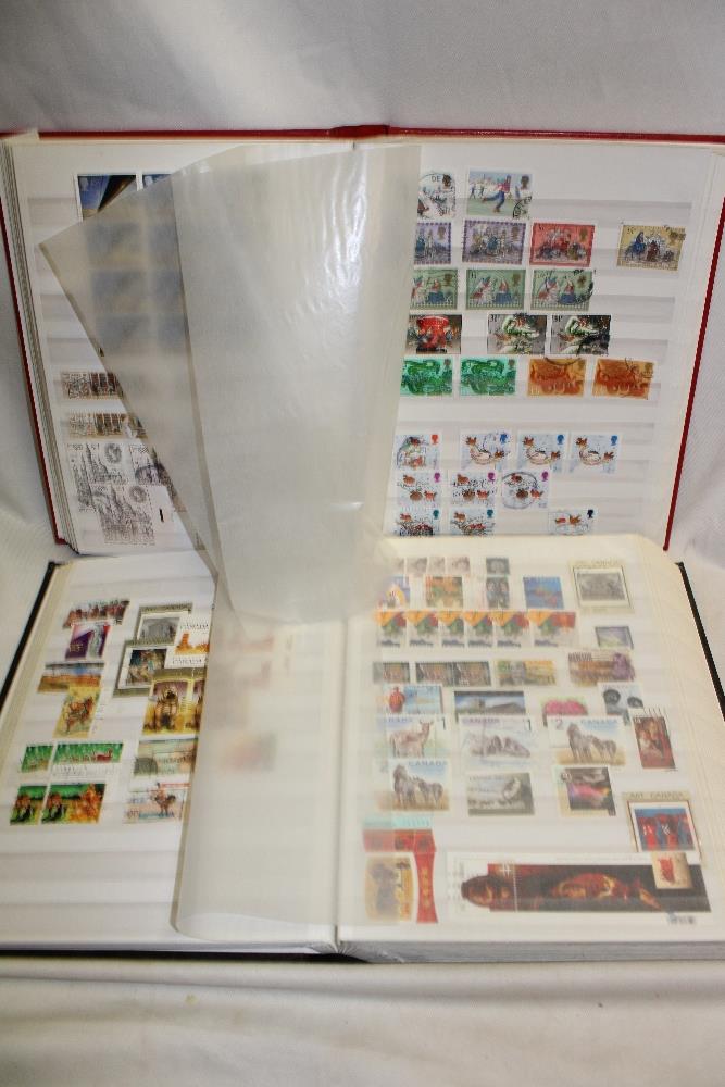 Two large stock books containing a selection of mixed World stamps