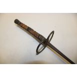 An old fencing sword with brass guard and leather grip (af)