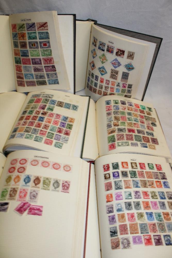 Six folder albums containing a collection of World stamps, - Image 2 of 2