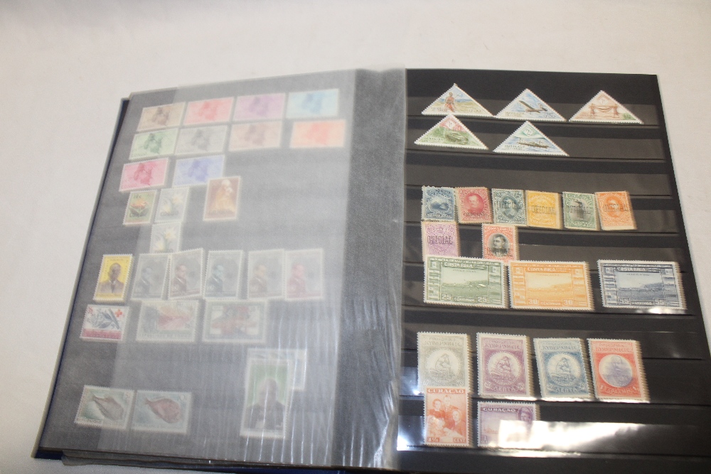A stock book containing a selection of British Commonwealth stamps