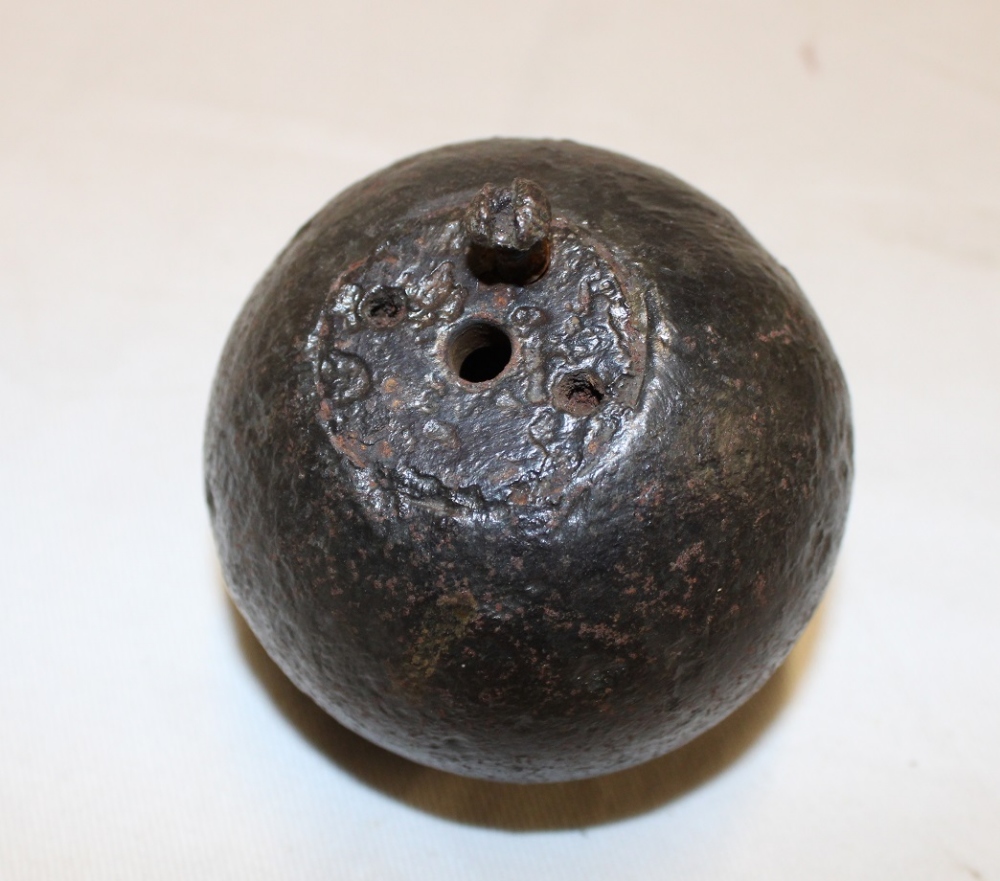 A 19th century iron spherical inert hand grenade,