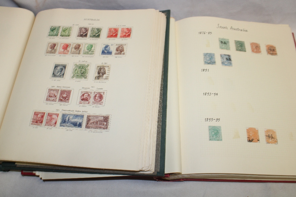 Two folder albums containing a collection of British Commonwealth stamps,