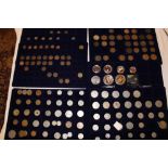 An aluminium coin case containing a collection of mixed GB and Foreign coins including some silver