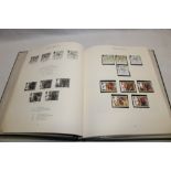 A folder album containing a collection of GB decimal mint stamps with high face value