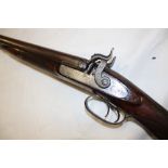 A 19th century 12bore double barrel percussion sporting gun by W Richards with 29" Damascus barrels,