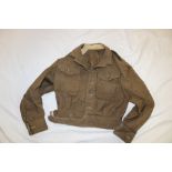 A 1944 pattern khaki battle-dress blouse,