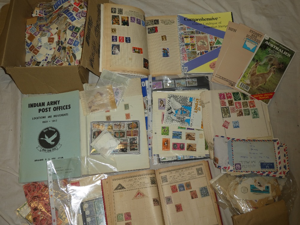 A large box containing World on/off paper stamps together with albums of stamps, stock cards etc.