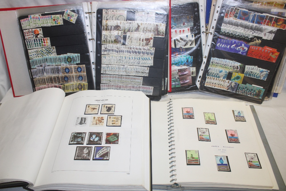 Four stock books/albums containing a collection of GB stamps