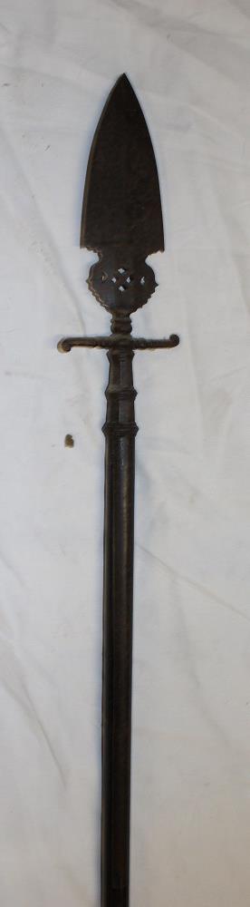 An old iron spontoon with 6" double edged blade mounted on a later ash shaft 87" long overall