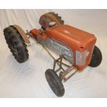 A 1960's Tri-ang pedal tractor (af)
