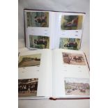 Two albums of various black and white and coloured postcards including greetings, topographical etc.