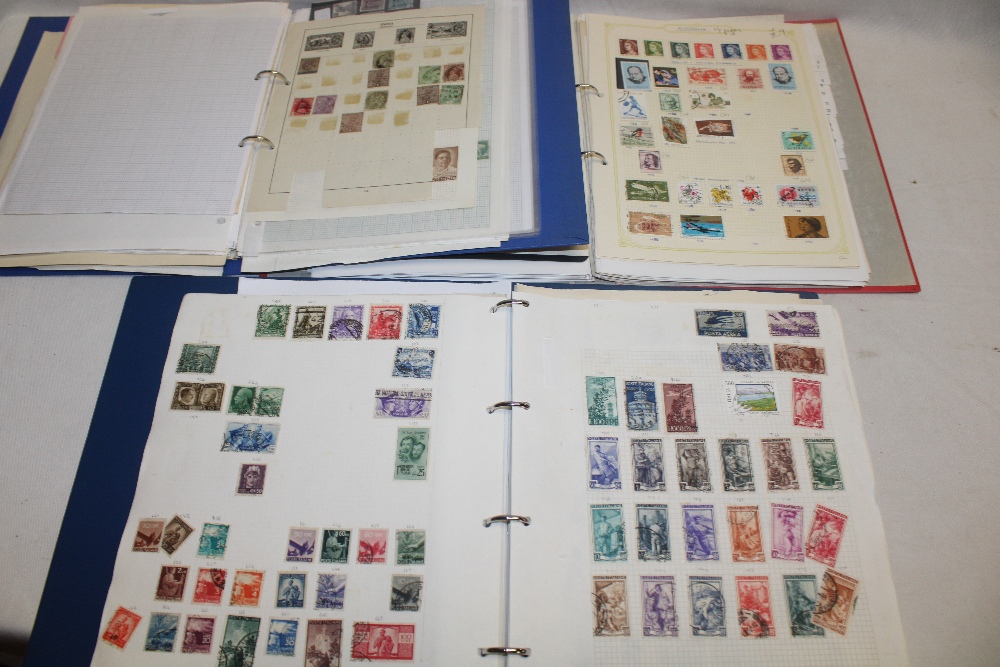 Three albums containing a selection of mixed World stamps