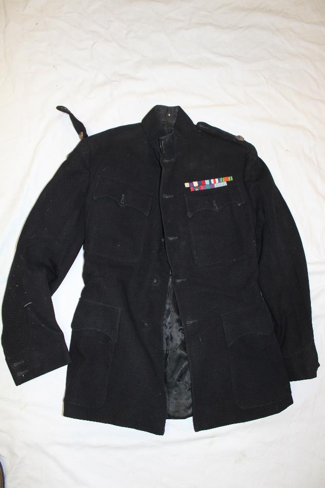 A 1948 dated Major's blue military four pocket tunic formerly the property of Major A. J. M.