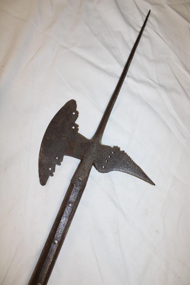 An 18th century iron halberd with 9" curved blade mounted on a later ash shaft 89" long overall - Image 3 of 3