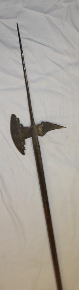 An 18th century iron halberd with 9" curved blade mounted on a later ash shaft 89" long overall - Image 2 of 3