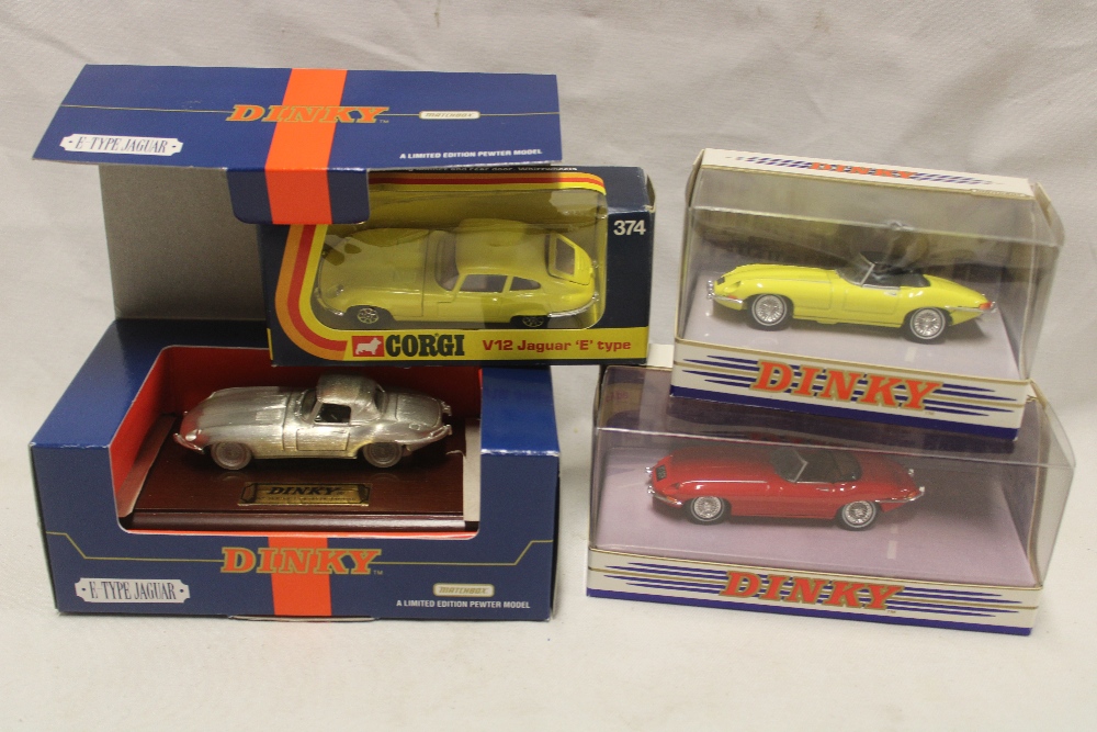 Three mint and boxed Dinky diecast E-type Jaguars and a Corgi No.